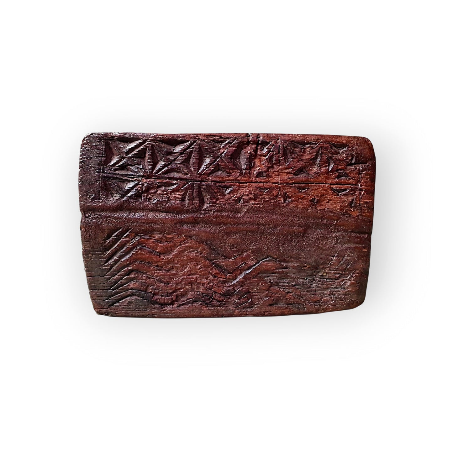 View of the back of the treen box showing the carved geometric border and wavy incised line decoration