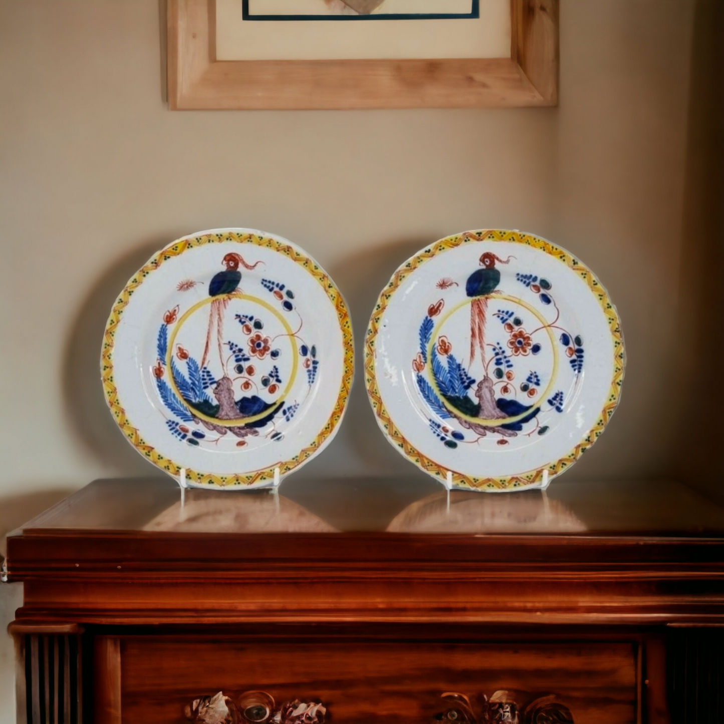 A pair of early 18th Century English antique polychrome delftware plates, attributed to Norfolk House Pottery, Lambeth, London, circa 1730