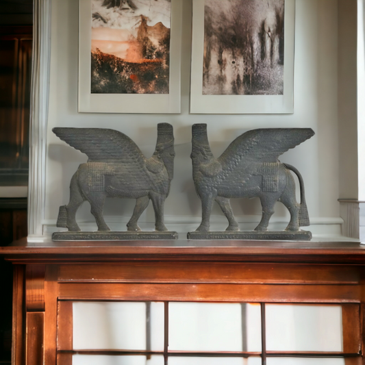A Large Pair of 19th Century Cast Iron Plaques, Each Depicting A Persian Sphinx