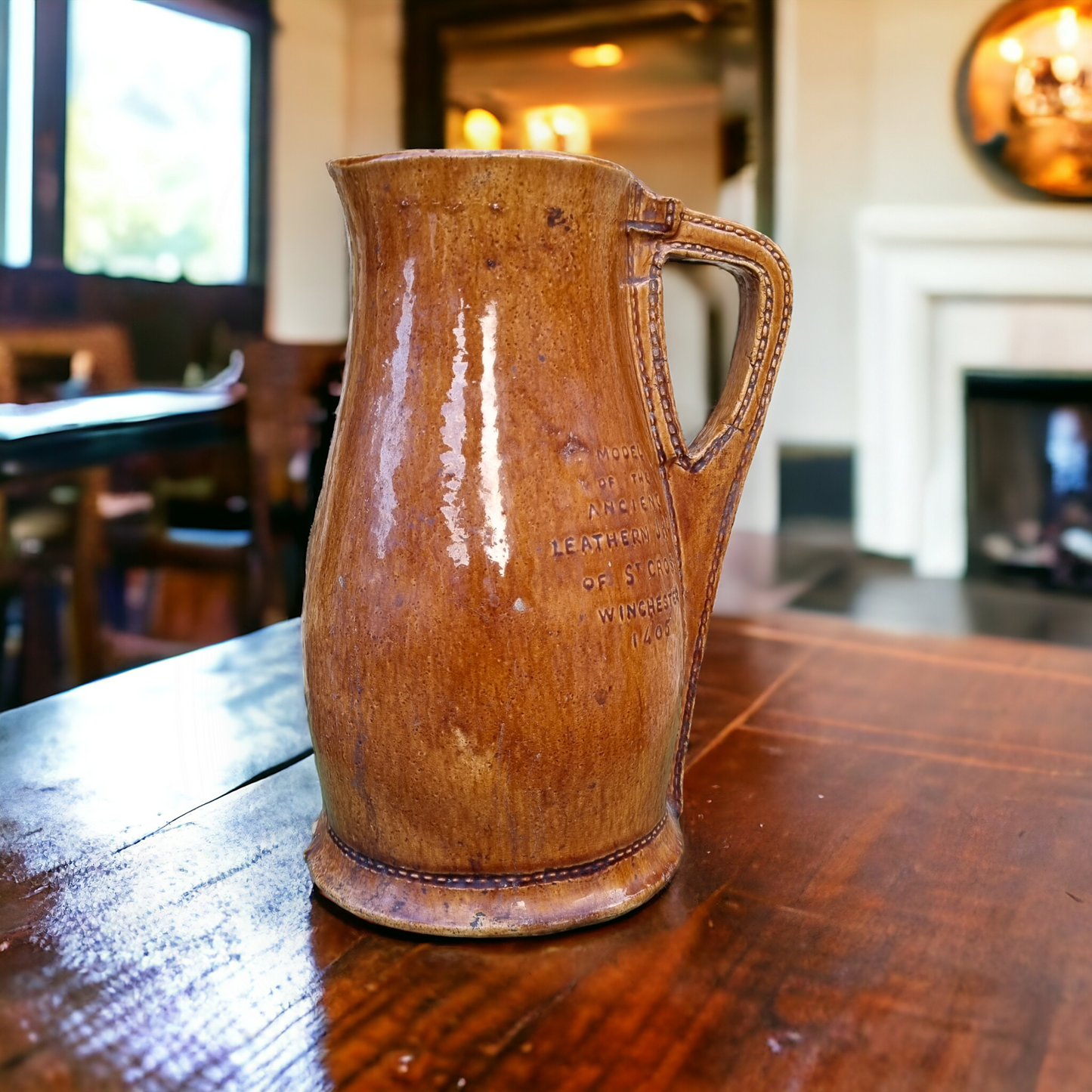 Large 19th Century English Antique Stoneware Jug / Pitcher in the Form of a Leather Bombard Impressed With The Stamp "MODEL OF THE ANCIENT LEATHER JACK OF ST CROSS WINCHESTER 1405".