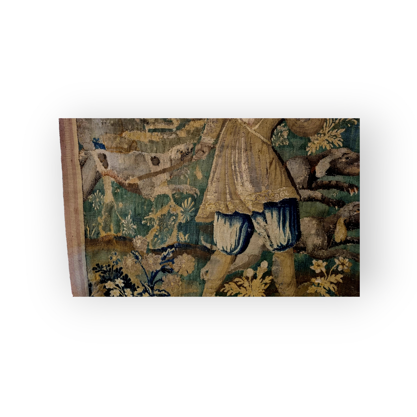 A Large 17th Century Flemish Antique Verdure Tapestry Fragment Depicting A Huntsman With Dogs And A Bear