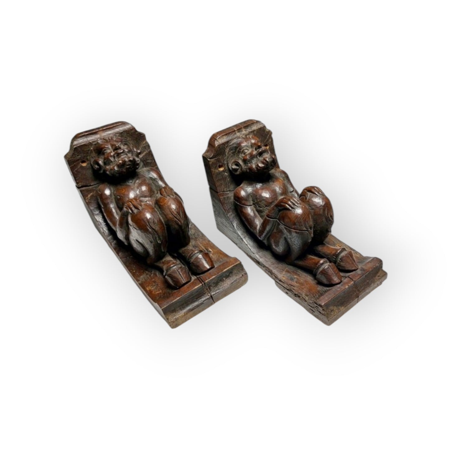 A Large Pair Of Early 17th-Century Antique Carved Oak Satyrs or Faunus