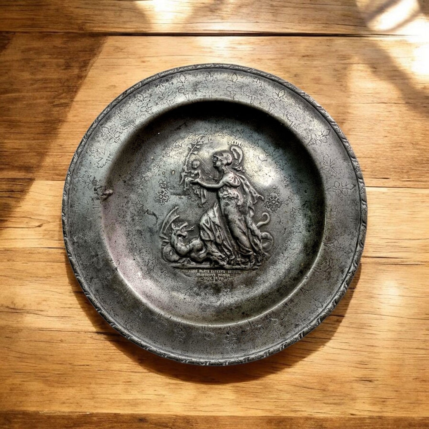 Late 18th-Century Dutch Antique Pewter Plate Decorated With Repoussé And Wriggle Work, Bearing The Mark For F De Leeuw, Brussels, (Active 1790-1811)