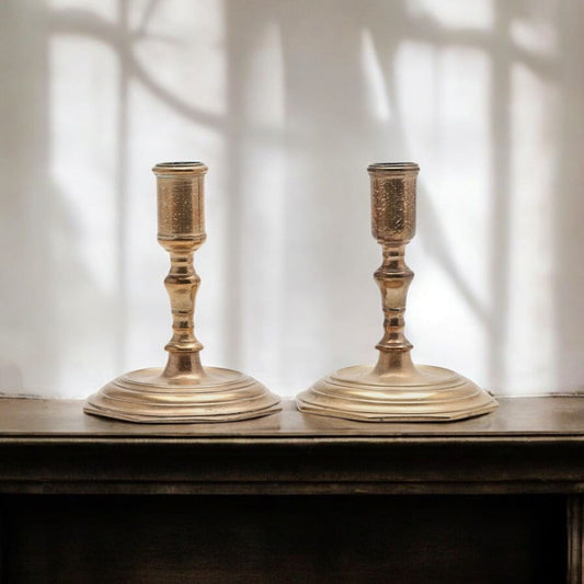 A Pair Of Early 18th-Century Baroque Antique Brass Candlesticks Of Squat Form
