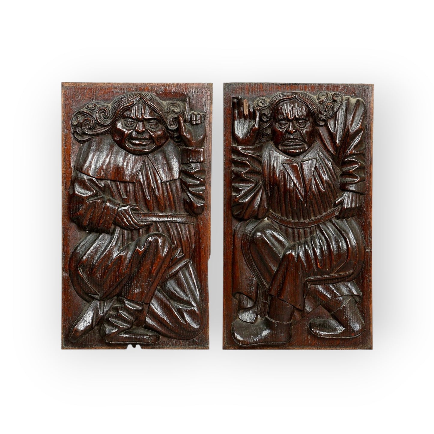 A Pair Of Late 16th-Century Antique Carved Oak Figural Panels