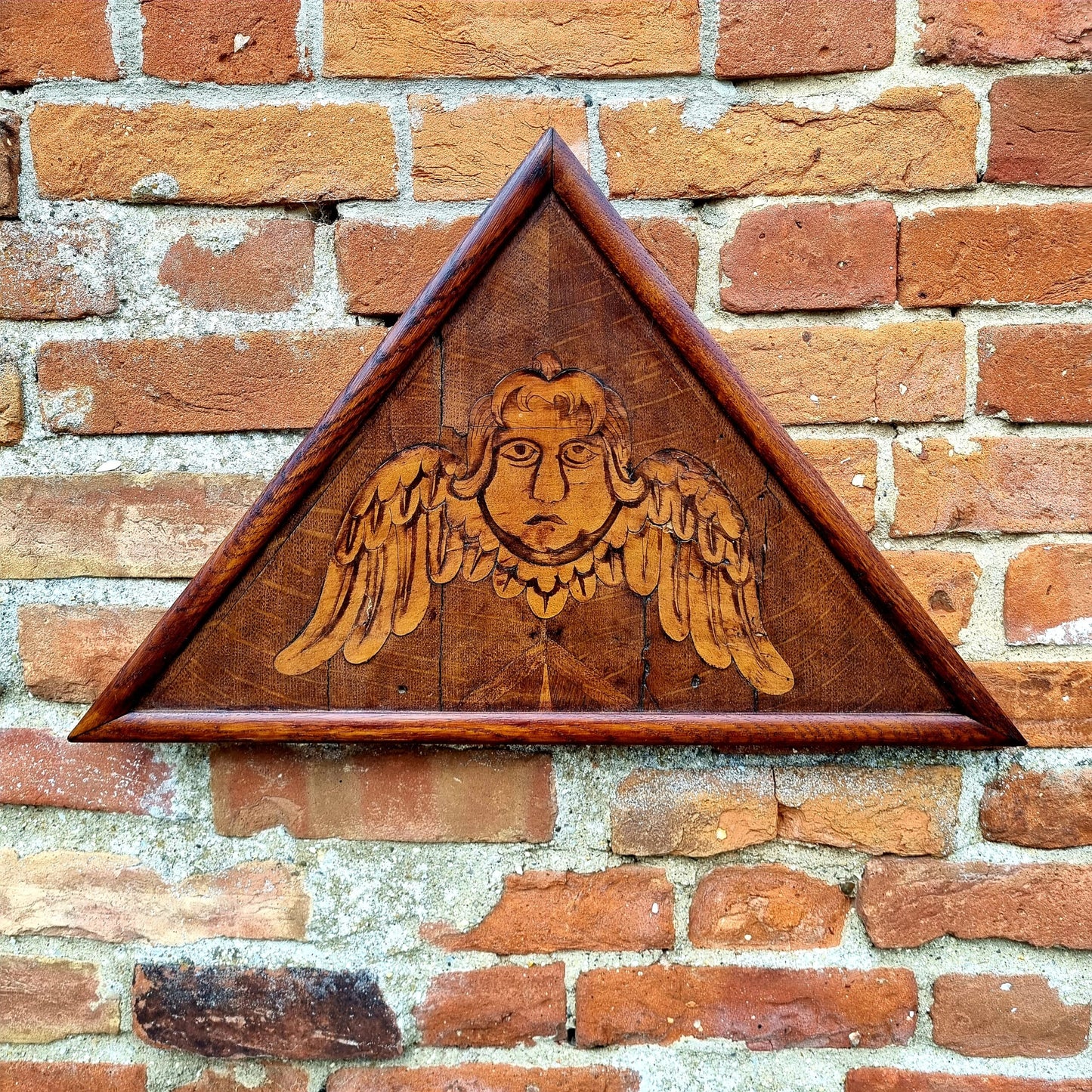 Early 18th Century Antique Oak Panel with Inlaid Veneer Depicting a Winged Angel
