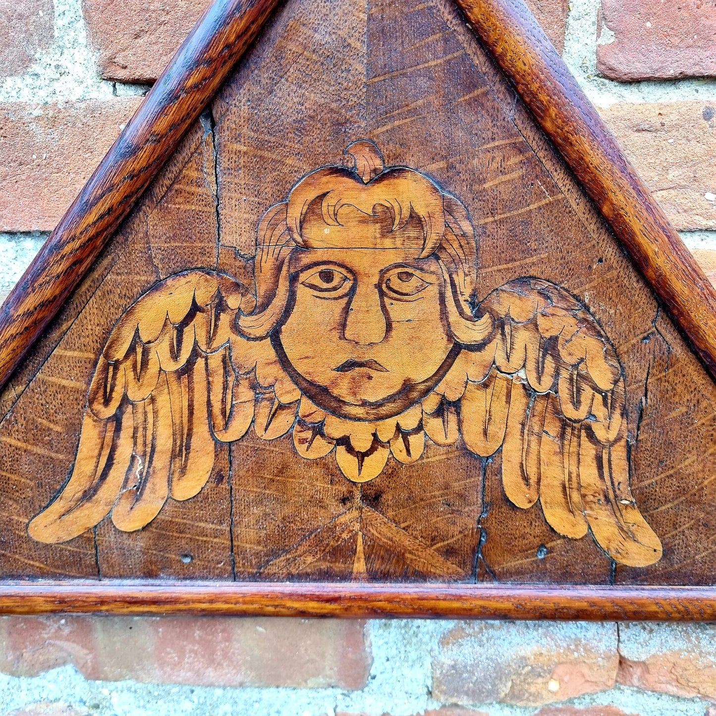 Early 18th Century Antique Oak Panel with Inlaid Veneer Depicting a Winged Angel