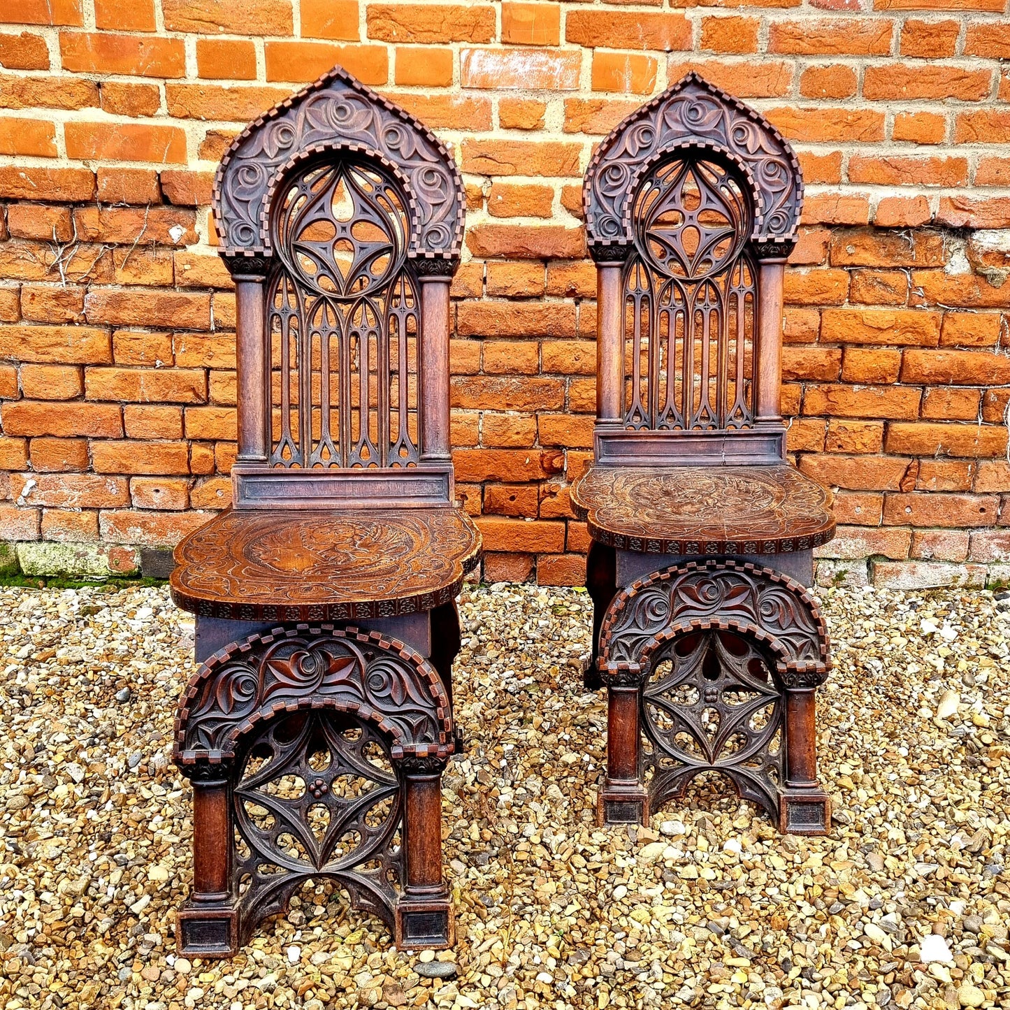 Follower of Augustus Pugin (1812-1852) - Rare Pair of Mid 19th Century Antique Walnut Gothic Revival Hall Chairs, Each Carved With The Symbol of Saint Mark