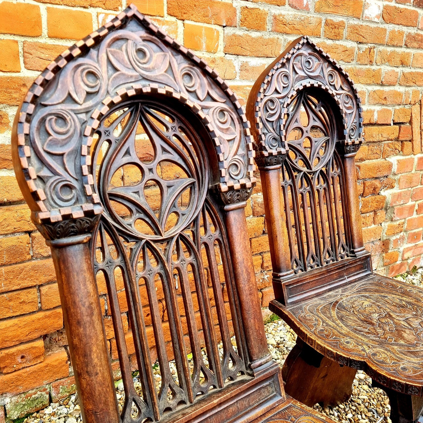 Follower of Augustus Pugin (1812-1852) - Rare Pair of Mid 19th Century Antique Walnut Gothic Revival Hall Chairs, Each Carved With The Symbol of Saint Mark