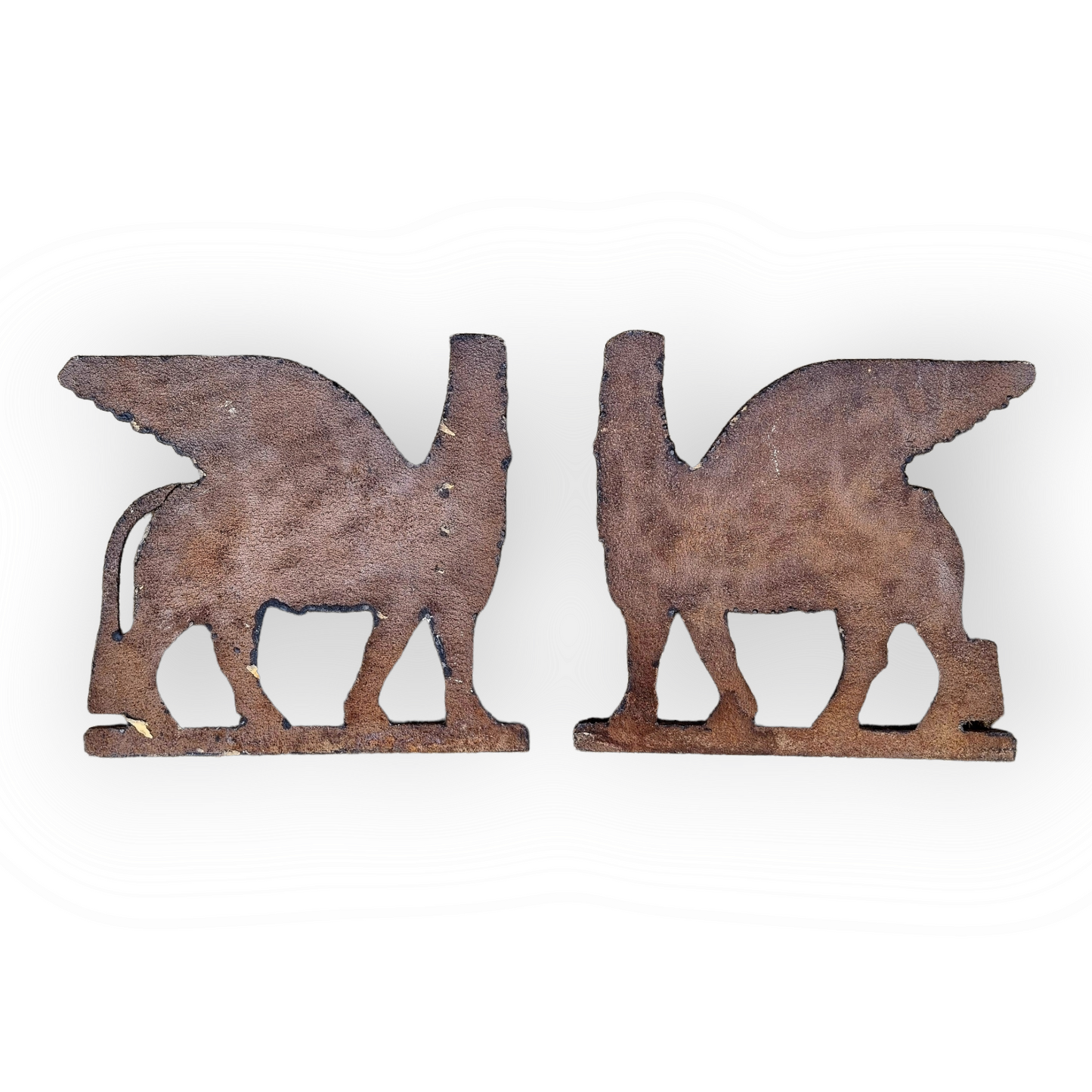 A Large Pair of 19th Century Cast Iron Plaques, Each Depicting A Persian Sphinx