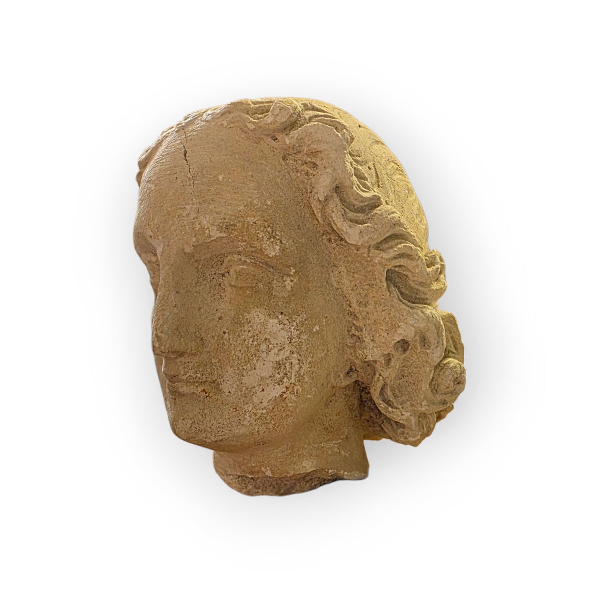 A 16th Century French Gothic Antique Carved Limestone Head of a Youth, probably an Angel or Youthful Saint, Attributed to Northern France, Troyes, Champagne, c.1500–1540