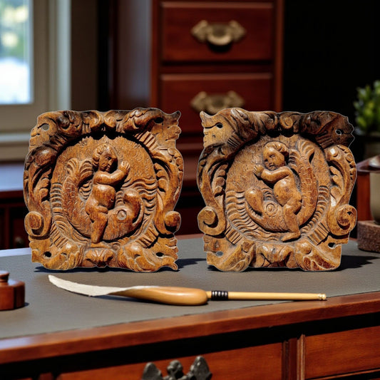 A Pair Of Charming 17th-Century Decorative Antique Carved Oak Panels Depicting Cherubs Riding Upon Sea Monsters