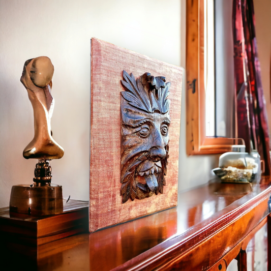 A Late 17th Century / Early 18th Century English Antique Carved Pine Plaque in the Form of a Green Man