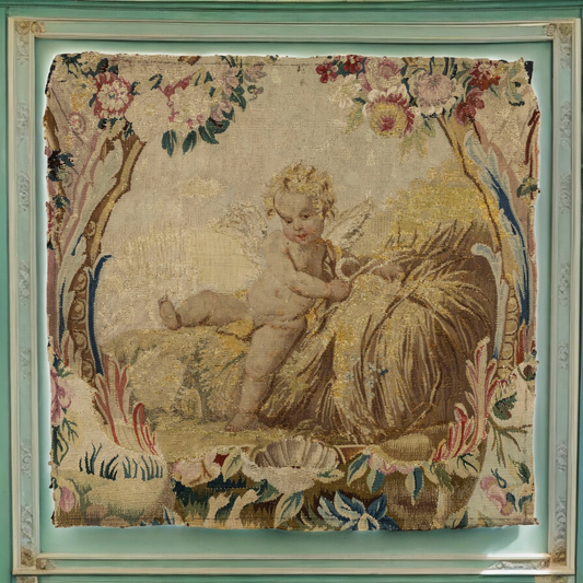 An 18th-Century French Antique Aubusson Tapestry Fragment Depicting A Winged Cherub / Putto