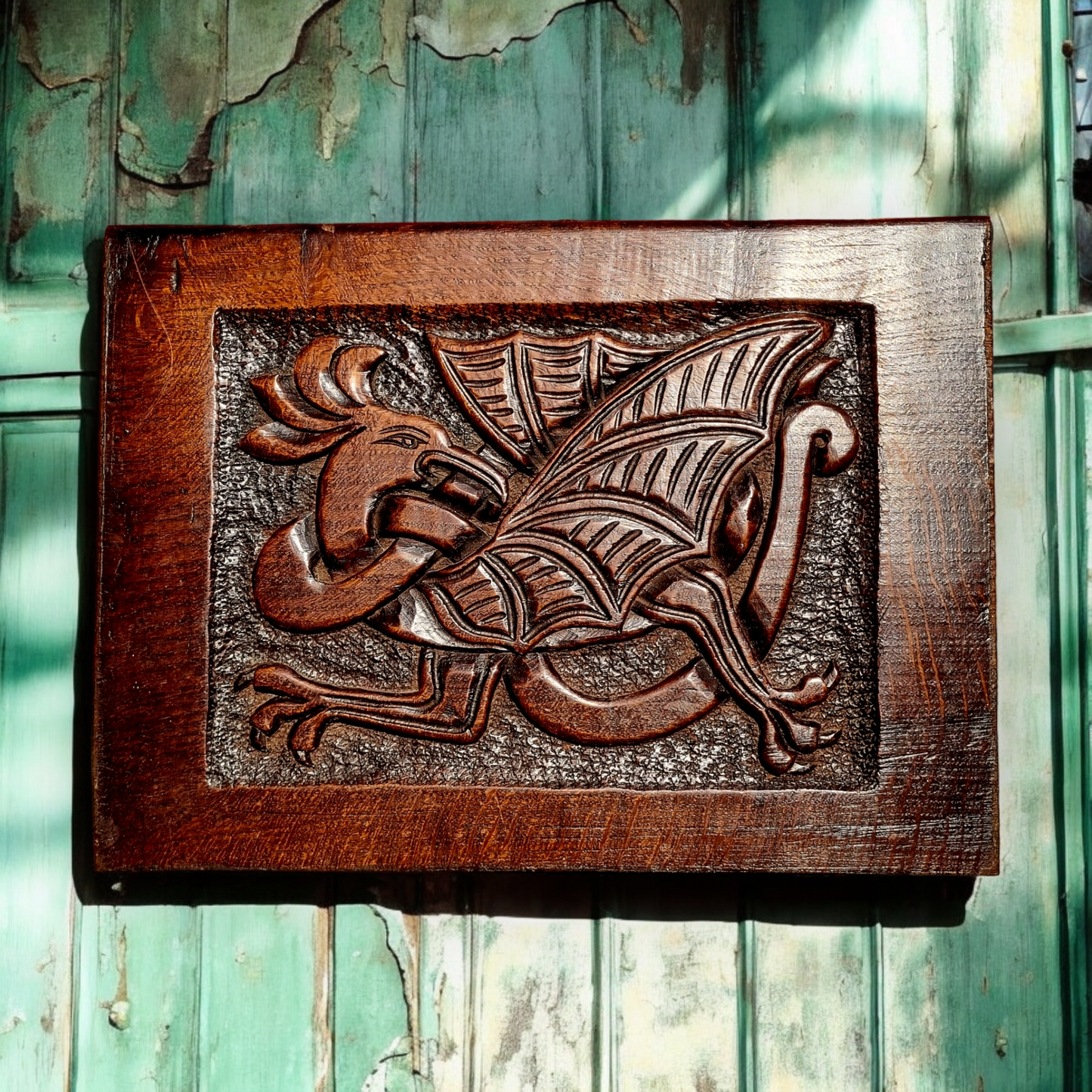 A 17th Century, Charles II Period, English Antique Carved Oak Panel Depicting A Cockatrice, circa 1680