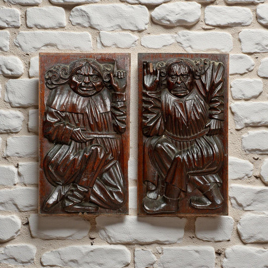 A Pair Of Late 16th-Century Antique Carved Oak Figural Panels