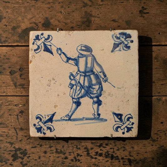 Early‑to‑Mid 17th‑Century Dutch Antique Delftware Tile Depicting a Soldier with Pike Drawn, circa 1625–1650