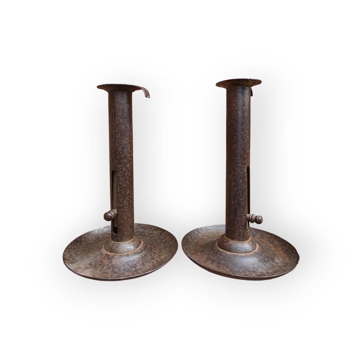 Pair of Holt Antiques at Walsingham Mill adjustable metal candle holders with a rustic dark iron distressed finish.