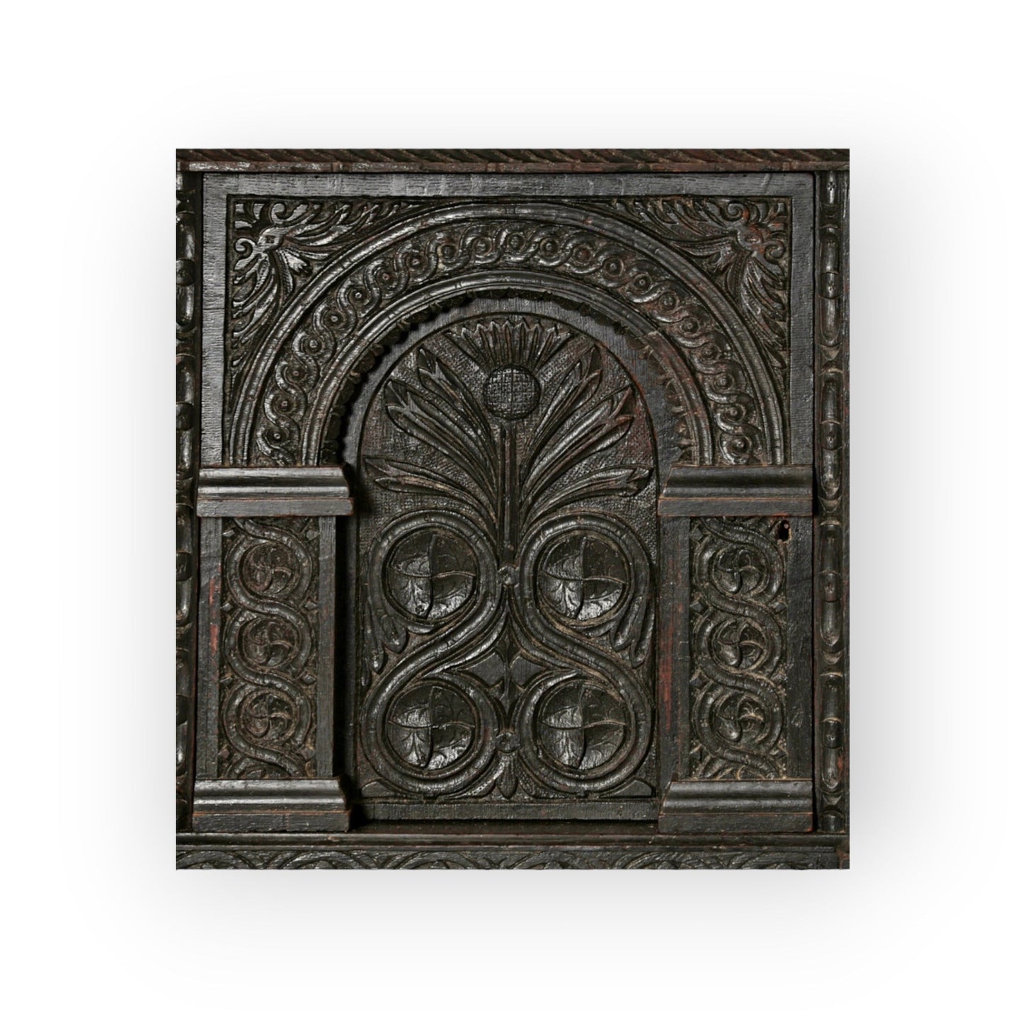 Holt Antiques at Walsingham Mill 17th century dark oak wall panel with intricate Jacobean hand-carved floral motifs.