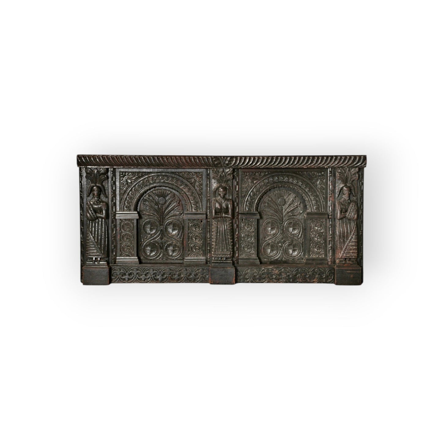 Holt Antiques at Walsingham Mill 17th-century dark oak wall panel with intricate Jacobean carvings and caryatid figures.