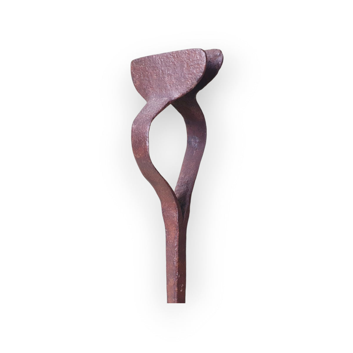 Detail of the curled iron terminal of the rushlight holder, designed to grip a burning rush or peer