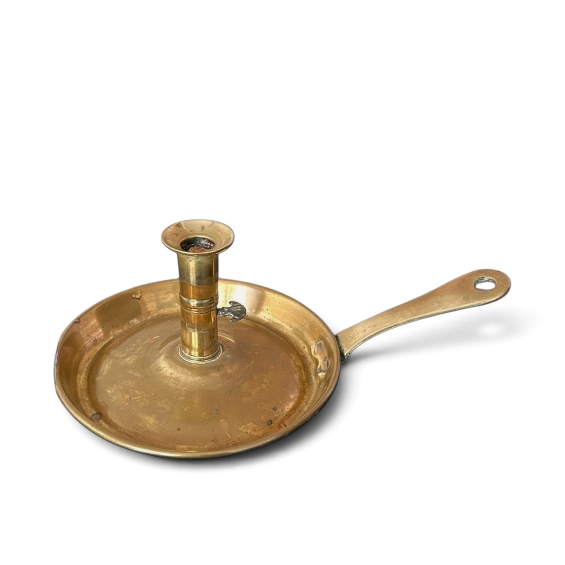Georgian brass frying pan chamberstick with sliding ejector, c.1770-1800, with white background