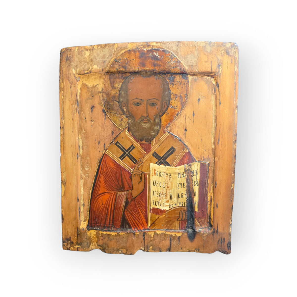 An Early 19th Century Antique Icon of Saint Nicholas the Wonderworker, Half-Length, Holding the Gospel