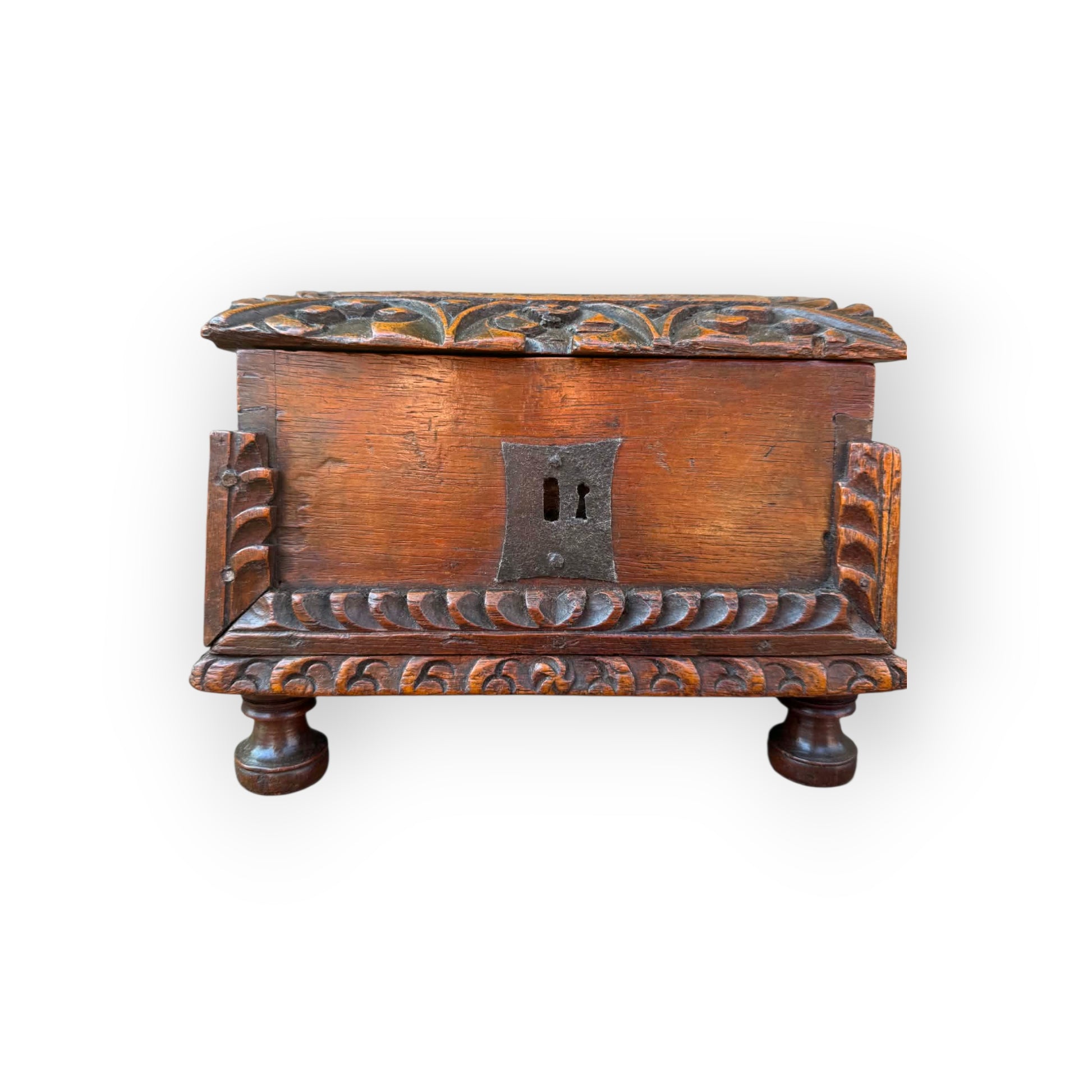 17th century Continental carved oak table casket with original iron lock plate, gadrooned base moulding, and bun feet