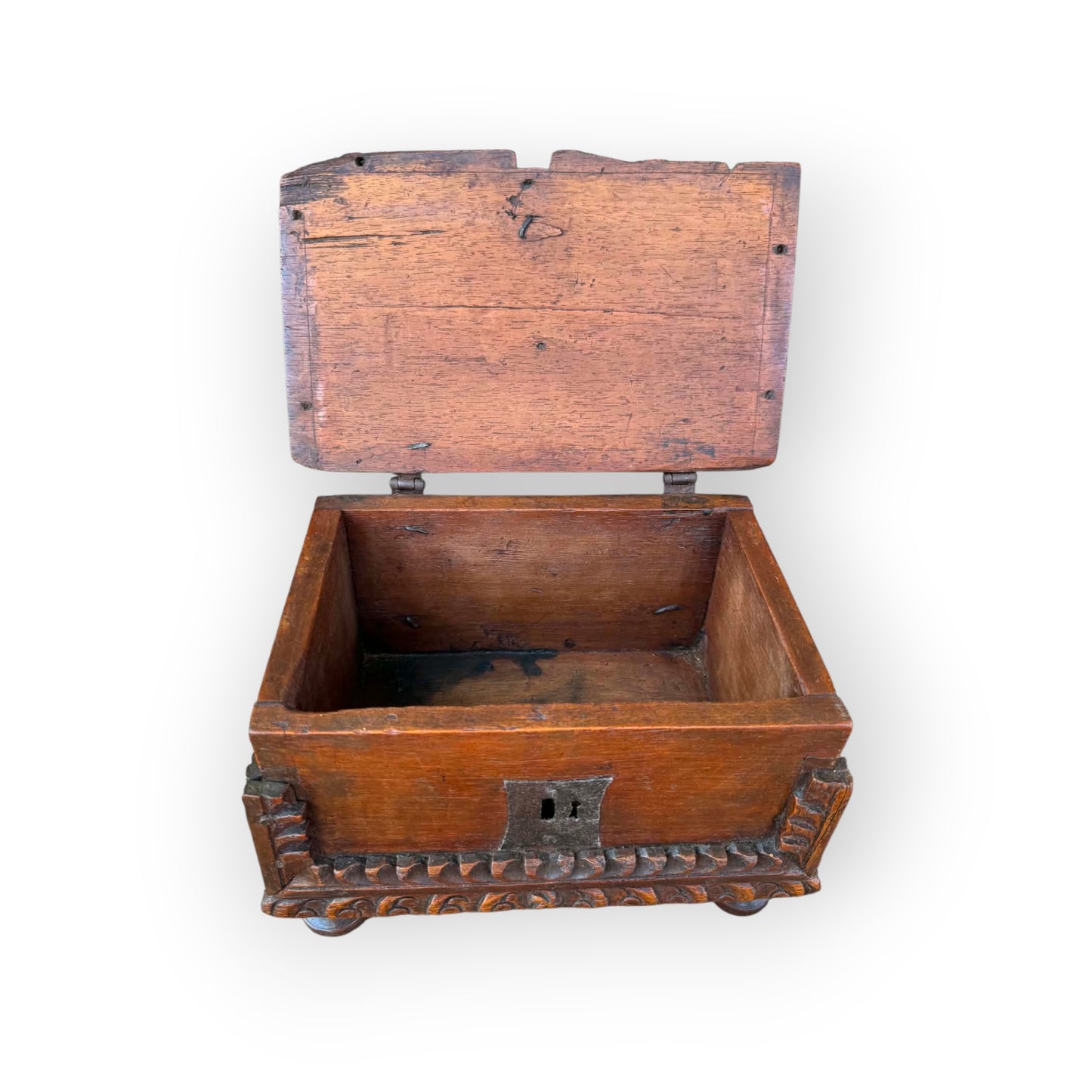 Honest untouched interior of 17th century Continental oak casket showing boarded construction and original surface