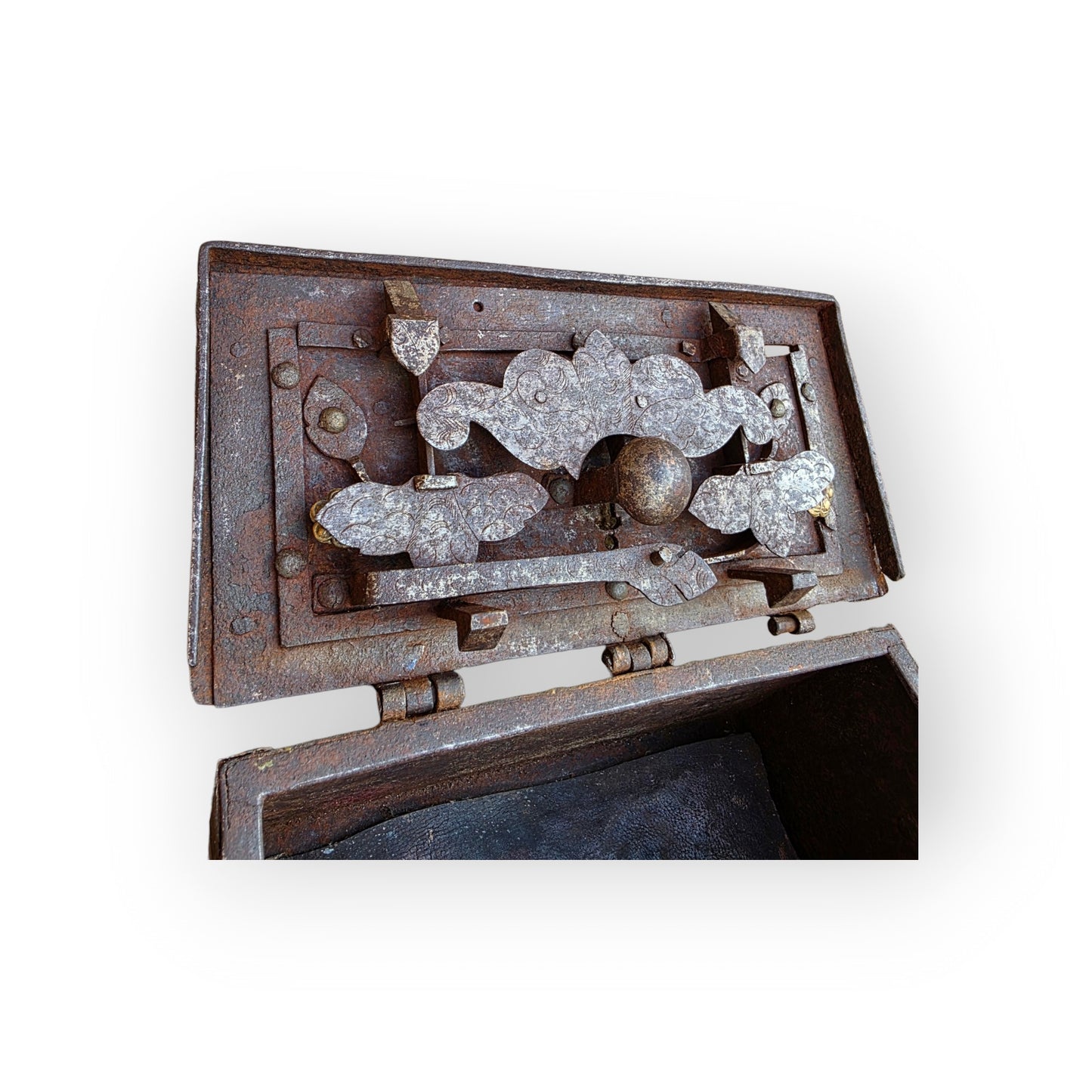 Interior of the lid of a Nuremberg iron casket showing the elaborate pierced multi-bolt steel lock mechanism