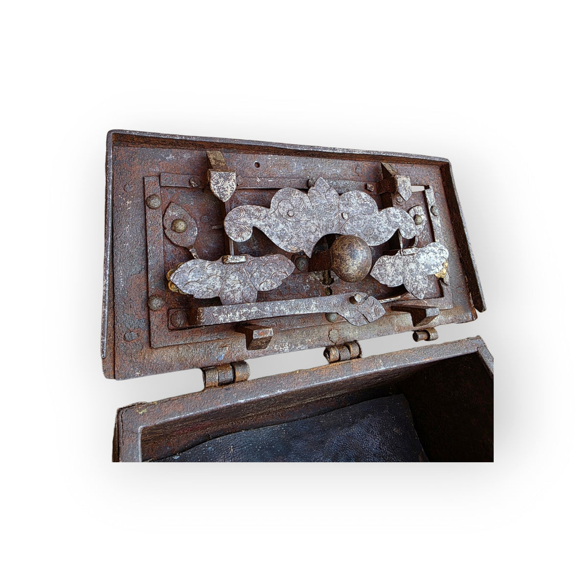 Interior of the lid of a Nuremberg iron casket showing the elaborate pierced multi-bolt steel lock mechanism