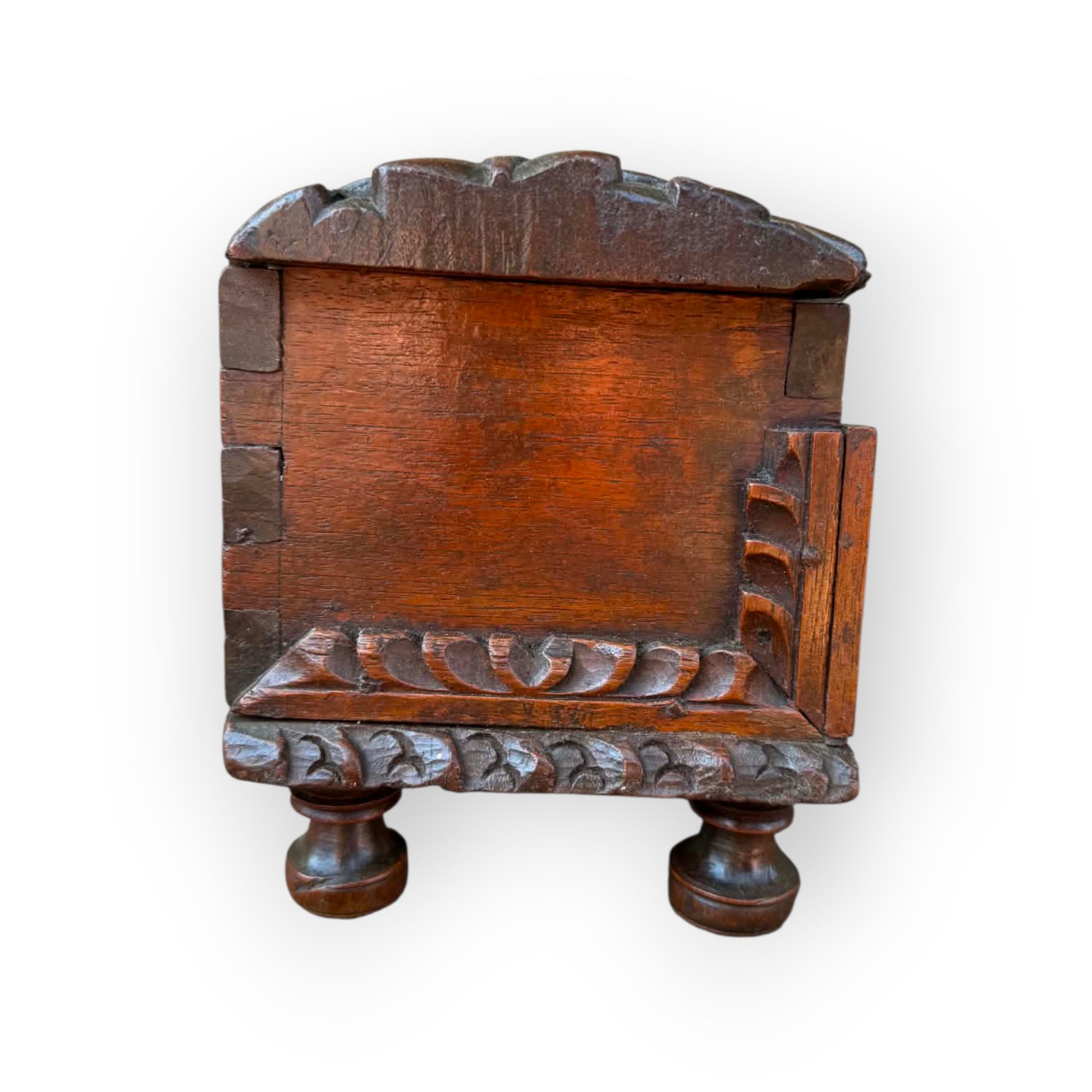 Carved acanthus lunettes and applied corner brackets on probably Iberian 17th century oak table box.