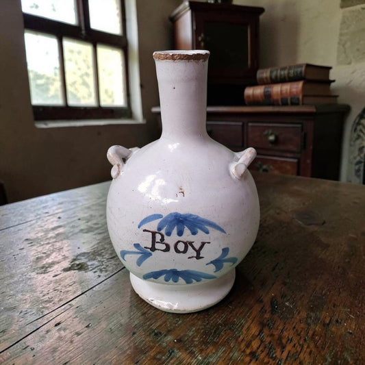 A 17th Century, French Antique, Faience "Boy" Bottle, Circa 1680, Attributed to Nevers, France