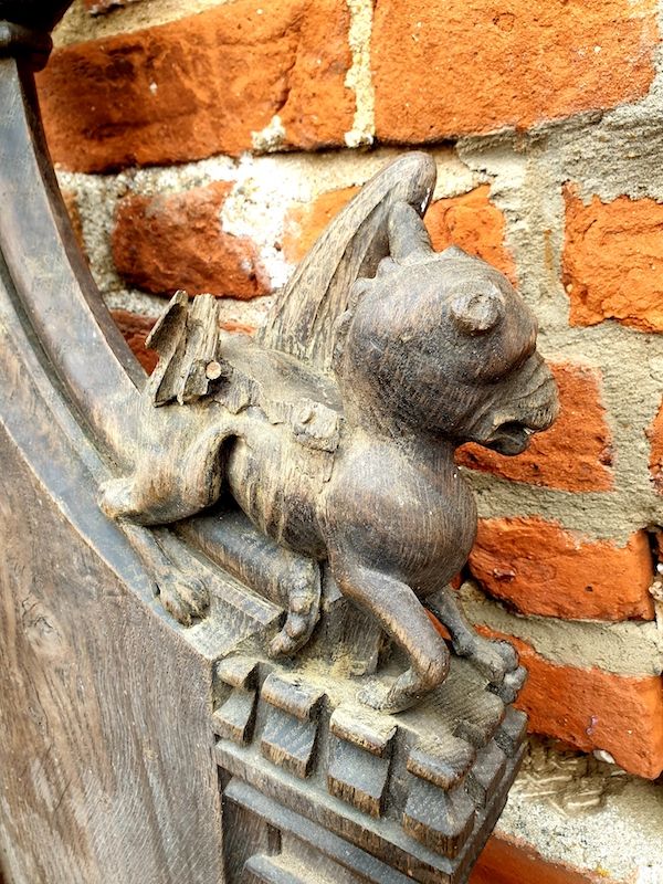 Ex Great St. Mary's Church, Cambridge - A Fine 16th Century Style, Mid-19th Century Made, English Antique Carved Oak Church Pew End with Poppy Finial and Dragon-Carved Elbow