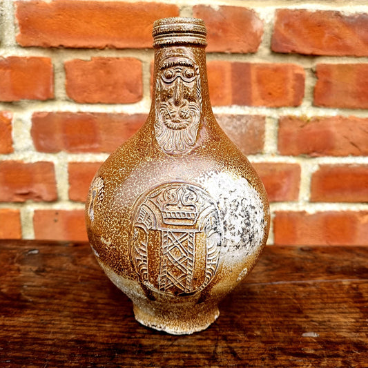 Early 17th Century German Antique Stoneware Bellarmine Jug or Bartmannkrug Bearing The Arms of Amsterdam, Circa 1600-1620