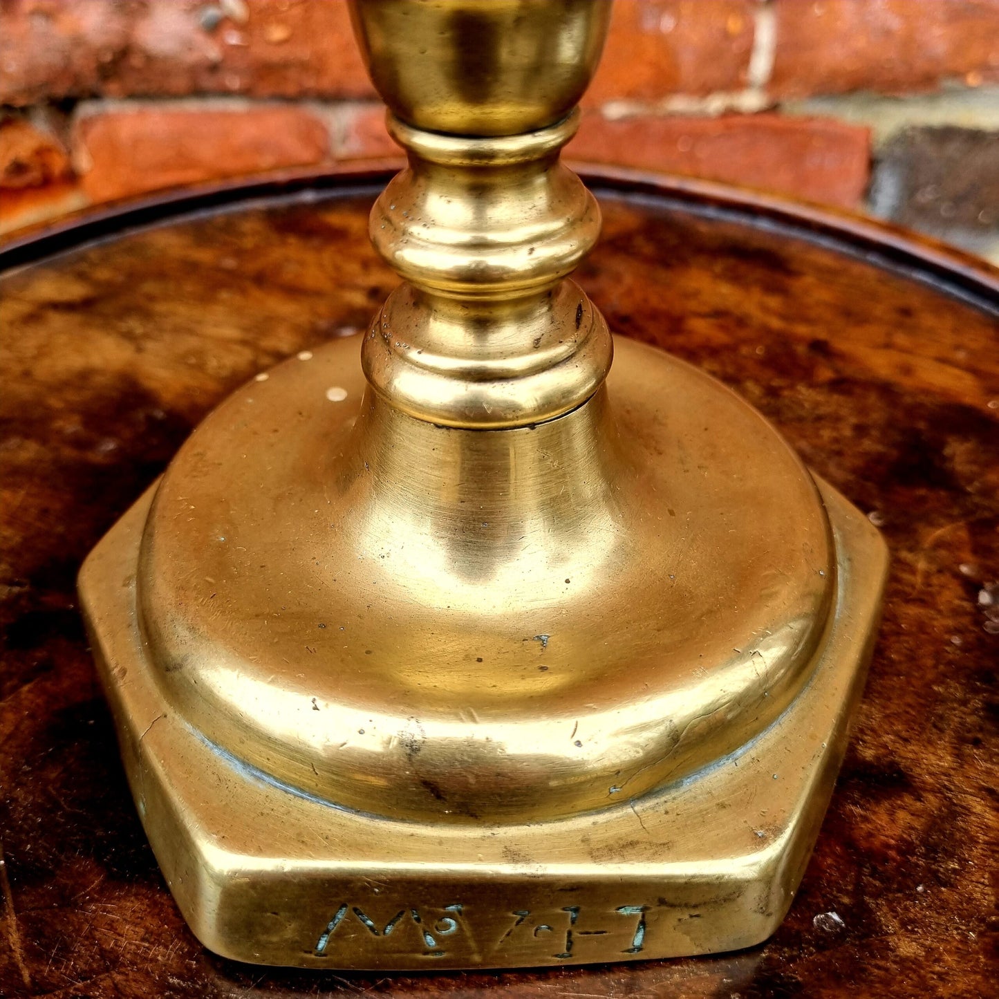 17th Century French Antique Brass Candlestick, circa 1680, bearing the initials "MVH"