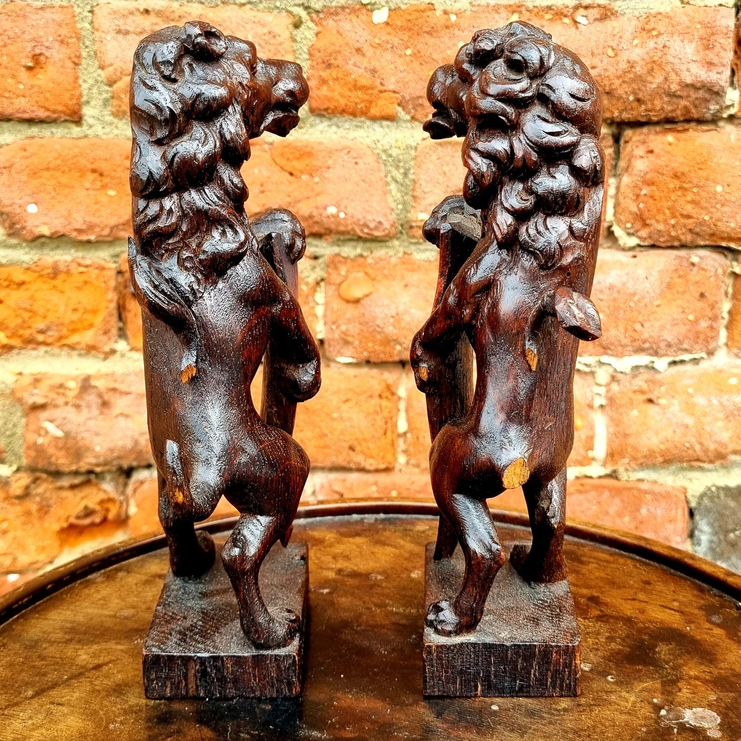 Pair of 19th Century Gothic Revival Antique Carved Oak Rampant Lions Bearing Polychromed Shields with the Initials "R" & "H"