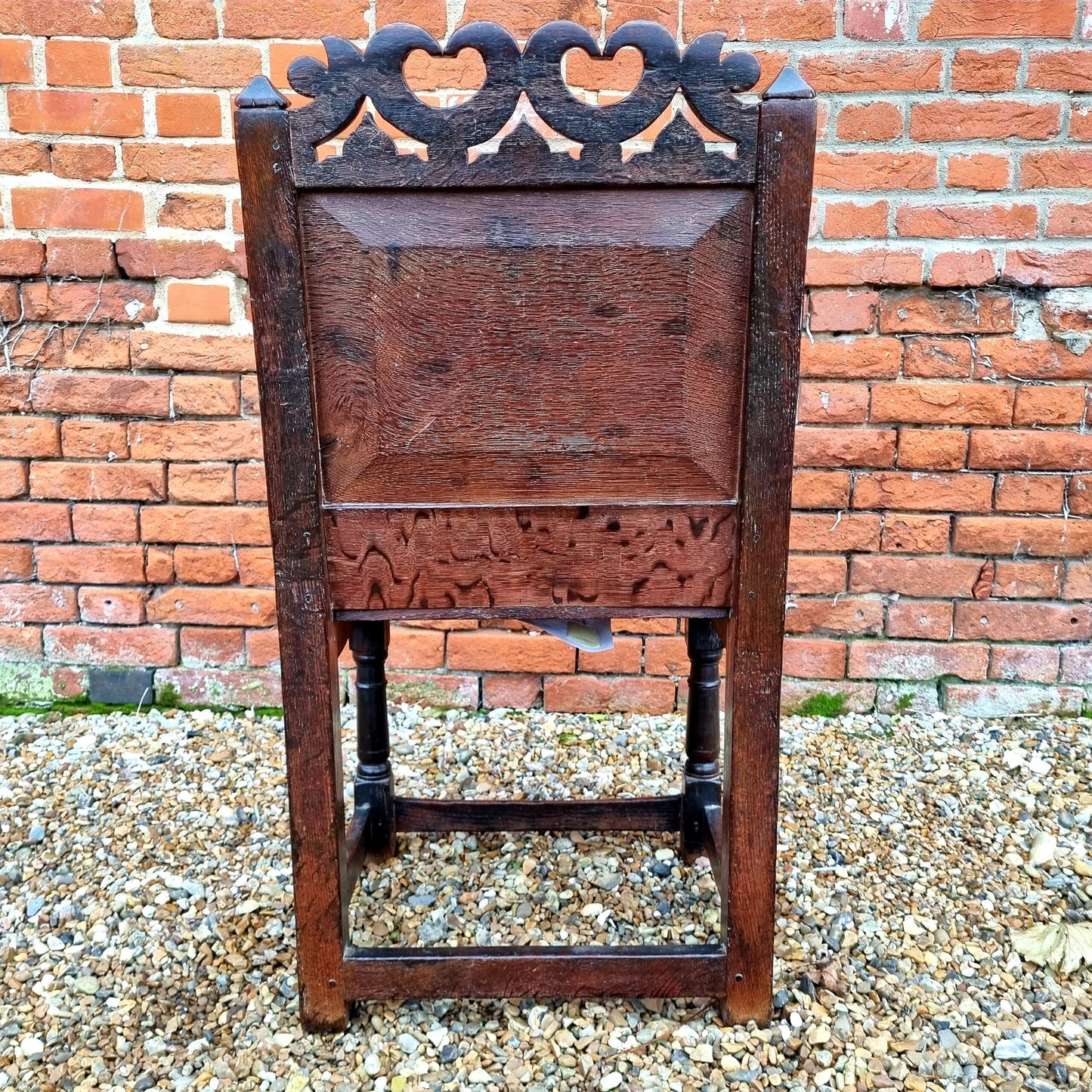 Mid 17th Century English Antique Oak Back Stool, Circa 1640. A similar example is held in the collection of the Victoria and Albert Museum, London